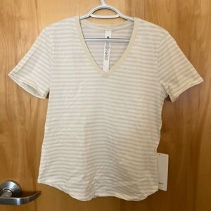 Lululemon Athletica Cream and White Striped V-Neck Tee